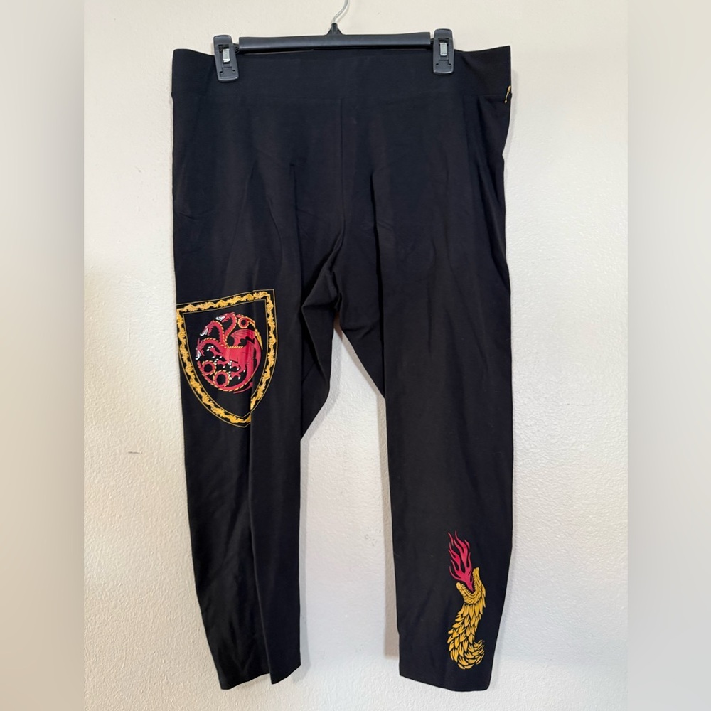 Torrid Black Pants with Red and Gold Accents
